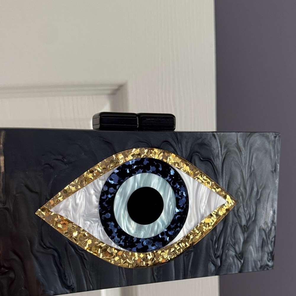 Eye Design Clutch with Gold and Black Accents